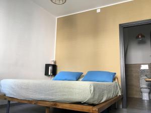מיטה או מיטות בחדר ב-Casa Escape