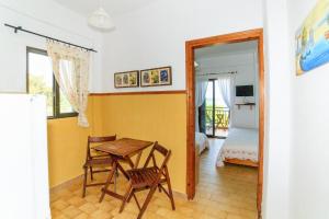 TV a/nebo společenská místnost v ubytování Emi House
