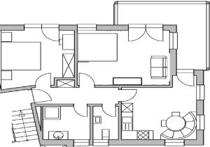 a black and white floor plan of a house at Chasa Vaidum in Samnaun