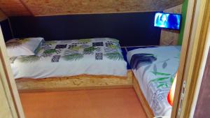 Postel nebo postele na pokoji v ubytování Le patio d'Eric B&B