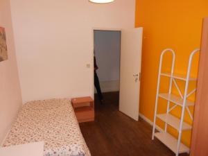 Cama ou camas em um quarto em Covilhã Hostel