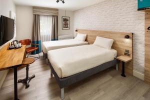 Ліжко або ліжка в номері ibis Styles Birmingham Oldbury