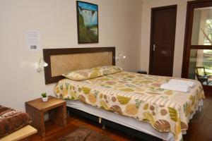 Cama ou camas em um quarto em IguassuEcoHostel - Eco Suítes - Hostel mais próximo das Cataratas