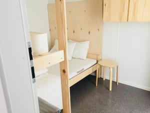 Domek Holenderski Chałupy 3 Kemping tesisinde bir odada yatak veya yataklar