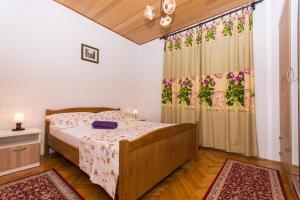 Postel nebo postele na pokoji v ubytování Apartman Maja