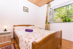 Postel nebo postele na pokoji v ubytování Apartman Maja