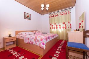 Postel nebo postele na pokoji v ubytování Apartman Maja