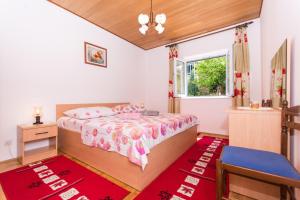 Postel nebo postele na pokoji v ubytování Apartman Maja