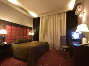 Postel nebo postele na pokoji v ubytování Hotel Doro City + 37 fotografií