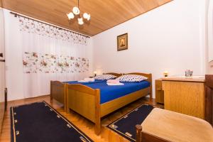 Postel nebo postele na pokoji v ubytování Apartman Maja