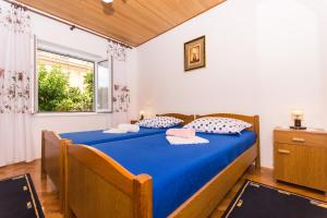 Postel nebo postele na pokoji v ubytování Apartman Maja
