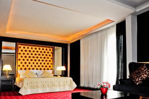 Postel nebo postele na pokoji v ubytování Hotel Doro City