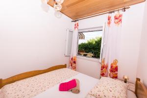 Postel nebo postele na pokoji v ubytování Apartman Maja