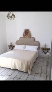 Postel nebo postele na pokoji v ubytování B&B VIRGINIA