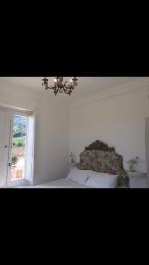 Postel nebo postele na pokoji v ubytování B&B VIRGINIA