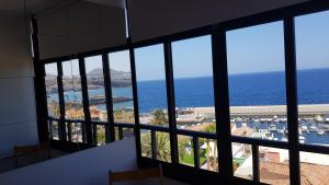 a view of the ocean from a building at Acogedor estudio en Candelaria en primera línea de mar in Candelaria