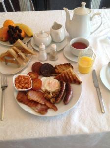 a plate of breakfast food on a table at Mourne Walks B & B in Annalong