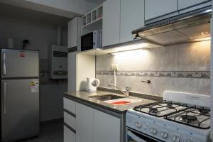 Virtuvė arba virtuvėlė apgyvendinimo įstaigoje Apartamento Inmejorable Ubicacion