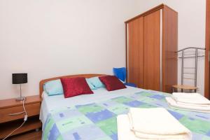 Postel nebo postele na pokoji v ubytování Apartments Vladimir