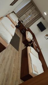 an overhead view of a bedroom with two beds at Penzion PKO Nitra in Nitra