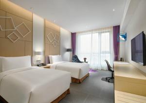 Foto da galeria de Q Hotel Haikou Meilan em Haikou