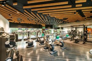 a gym with lots of treadmills and machines at Cerulean Tower Tokyu Hotel, A Pan Pacific Partner Hotel in Tokyo