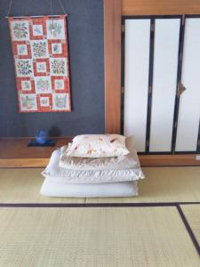 Guest House Hostel yukuru客房内的一张或多张床位