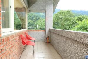 Balkón nebo terasa v ubytování Zuo An Hostel