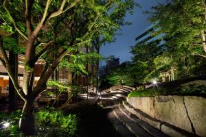 a stone path in a city at night at Cerulean Tower Tokyu Hotel, A Pan Pacific Partner Hotel in Tokyo