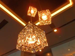 a group of lights hanging from a ceiling at Via Inn Nagoya Station Tsubaki-cho in Nagoya