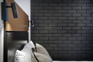 Voodi või voodid majutusasutuse CBD Motor Inn toas