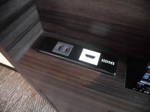 an electronic device on top of a wooden table at Via Inn Nagoya Station Tsubaki-cho in Nagoya