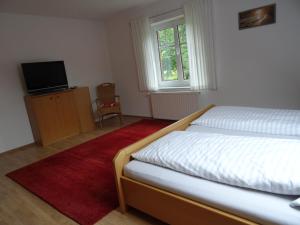 Postel nebo postele na pokoji v ubytování Bei Ute und Peter