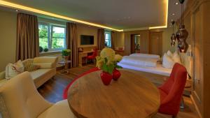 TV a/nebo společenská místnost v ubytování Boutique Hotel POST ANDECHS