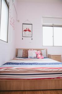 Postel nebo postele na pokoji v ubytování Dan Bao Homestay