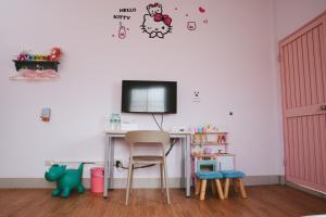 TV a/nebo společenská místnost v ubytování Dan Bao Homestay