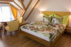 Tempat tidur dalam kamar di Hotel & Restaurant Hasenstrick