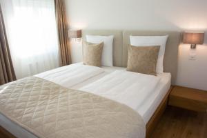 Postel nebo postele na pokoji v ubytování Hotel & Restaurant Hasenstrick