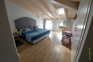 Postel nebo postele na pokoji v ubytování Spagnoi Rooms