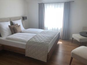 Postel nebo postele na pokoji v ubytování Hotel & Restaurant Hasenstrick