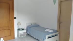 Postel nebo postele na pokoji v ubytování Palia's Hotel