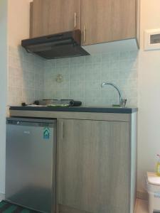 Kuchyň nebo kuchyňský kout v ubytování Hotel Mochlos