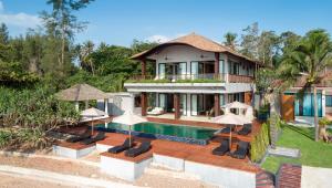 an image of a house with a swimming pool at Saai Resort in Bang Saphan Noi