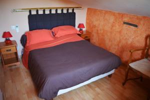 Katil atau katil-katil dalam bilik di Gîte Bois et Senteurs