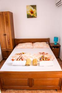 Postel nebo postele na pokoji v ubytování Friendly House