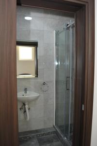Koupelna v ubytování Deltix Apartments