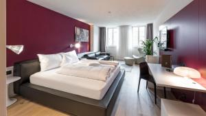 Postel nebo postele na pokoji v ubytování Guesthouse Suiteseven