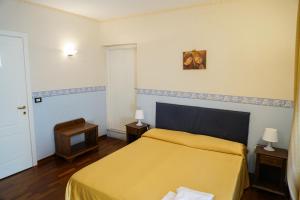 Кровать или кровати в номере Stesicorea Palace
