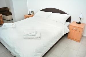 Postel nebo postele na pokoji v ubytování Deltix Apartments