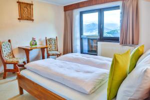 Postel nebo postele na pokoji v ubytování Hotel Pension Residence